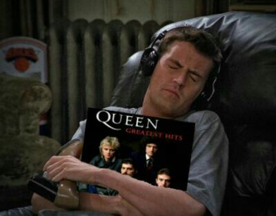 Chandler Holding a Queen Album